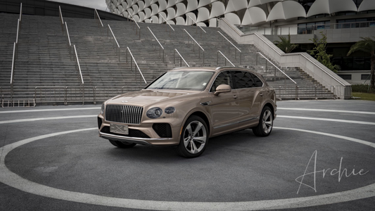 Bentley Bentayga Gold - Private Chauffeur Service.